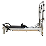 Pilates reformer with adjustable settings