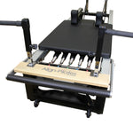 Plank bar accessory for Pilates reformers