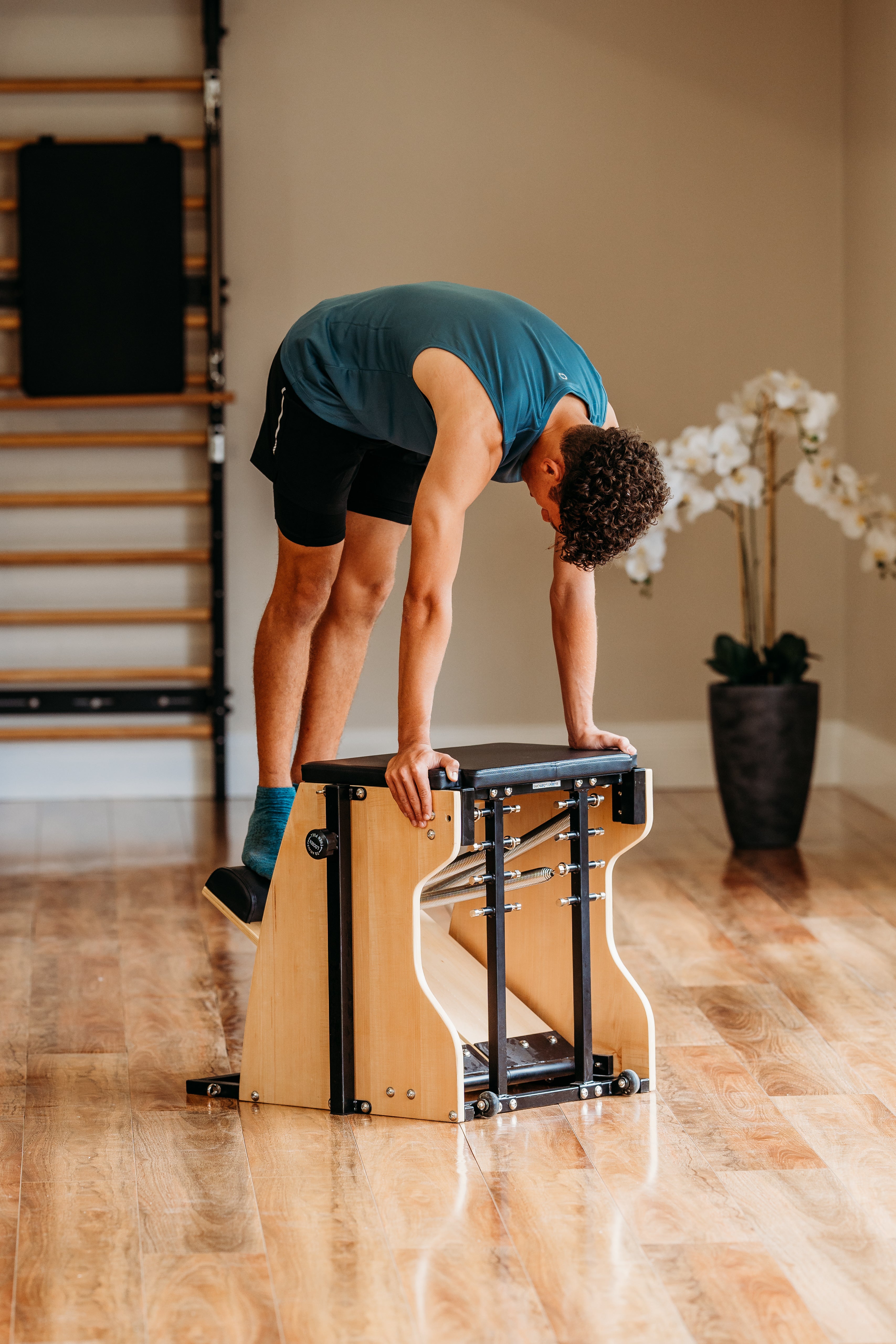 Pilates training session with reformer equipment