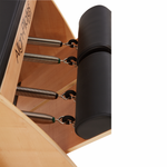 Series of Wunda Chair variations with wooden frame and padded seat